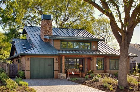 tan house with green metal roof|green roof tan.